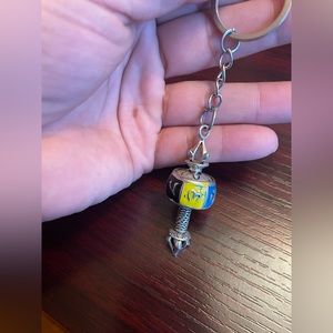 Buddhist prayer wheel key chain made in Nepal (new not used )